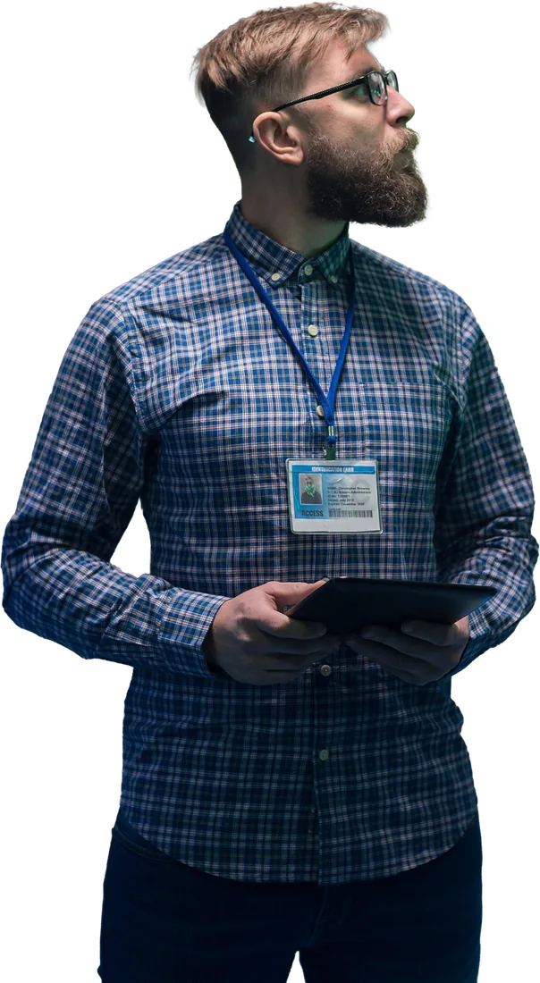 A Tech This Out engineer with a tablet in a server room